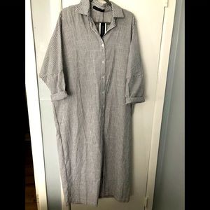 Brand New long linen dress runs very big;